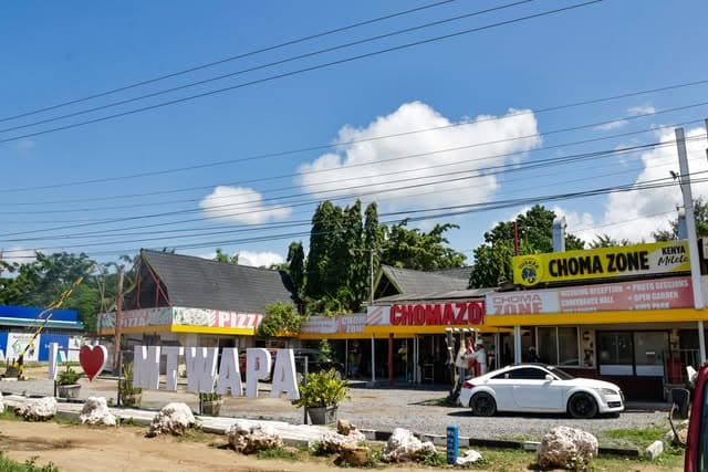 Choma Zone Mtwapa Palms exterior with I Love Mtwapa sign
